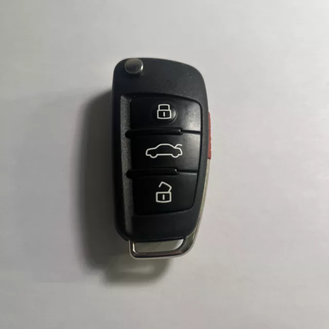 OEM AUDI Keyless Entry Remote Fob 4 Button Flip Key FCC: NBGFS12P71 + Uncut key