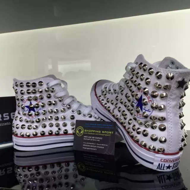 Converse bianche deals borchie oro