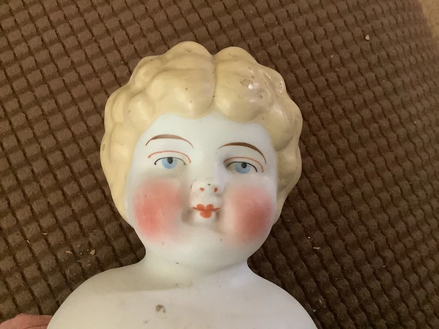 antique parian bisque doll on pink cloth body