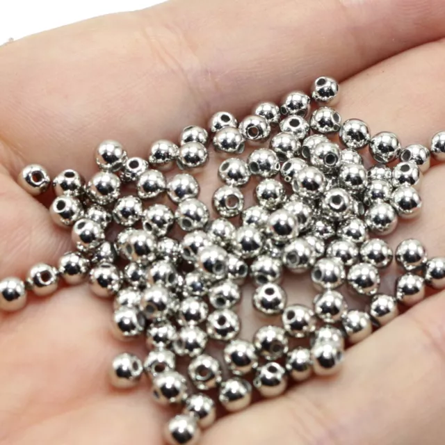 1000 cuentas espaciadoras de 4 mm de acrílico metálico de tono plateado opaco