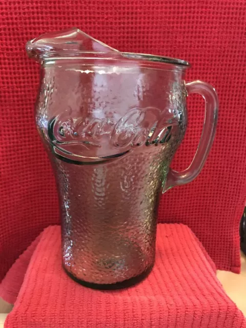 https://www.picclickimg.com/rUwAAOSwrfVZTA-8/Vintage-Coca-Cola-Pitcher-Indiana-Georgia-Green-64.webp
