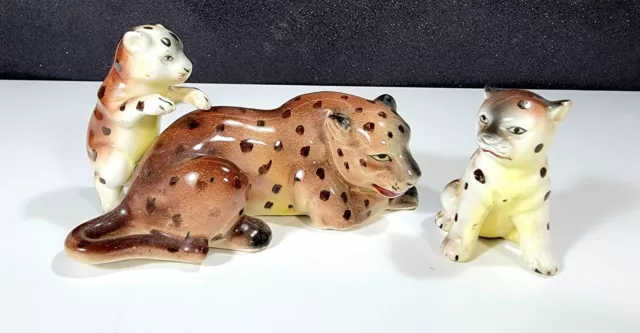 Vintage porcelain set of three leopard figurines. Japanese c 1970