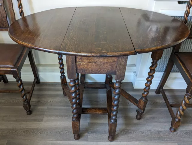 Drop leaf table and four chairs