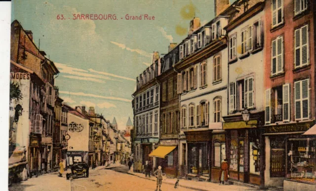 Carte postale ancienne MOSELLE SARREBOURG 63 grand'rue voiture écrite 1929