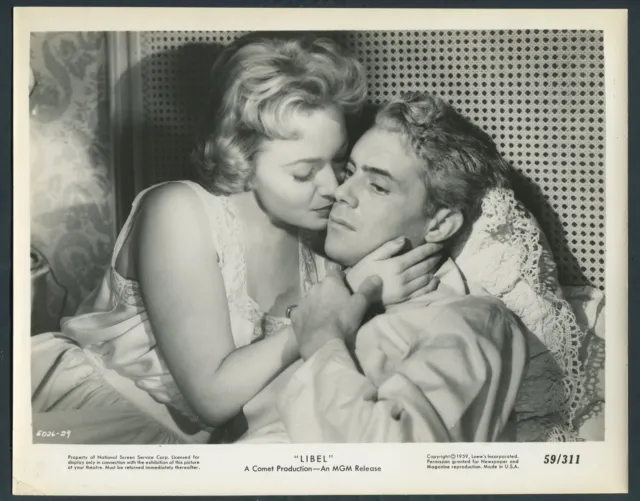 OLIVIA DE HAVILLAND DIRK BOGARDE in Libel '59 EMBRACE IN BED