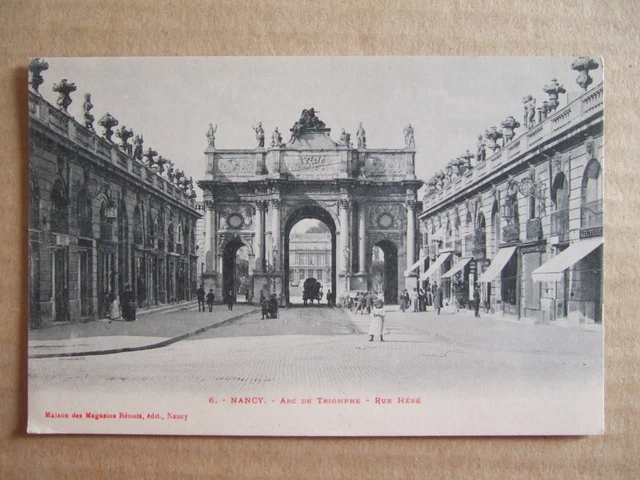 CPA NANCY (54) ARC DE TRIOMPHE - RUE HERE. MAISON DES MAGASINS REUNIS édit Nancy