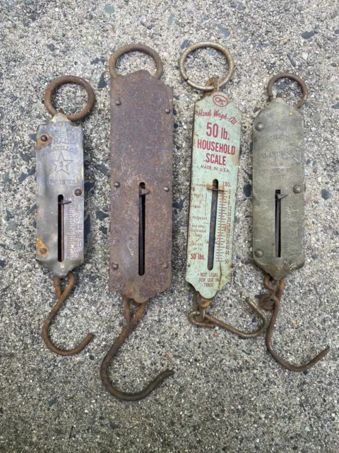 Four antique. hand held scales