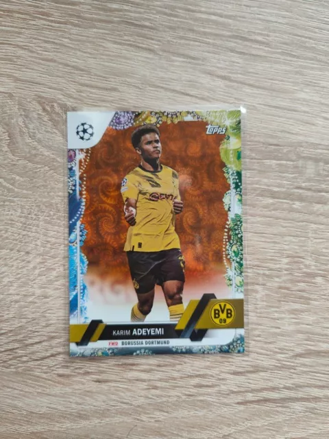 2022-23 TOPPS CARNAVAL EDITION UEFA CLUB COMPETITIONS Karim Adeyemi Orange #/25