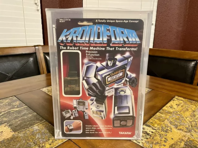 Transformers Takara 1984 G1 Kronoform Gold Lcd Watch Afa 80 New Sealed Rare! Transformers Takara 1984 G1 Kronoform Gold Lcd Watch Afa 80 New Sealed Rare!