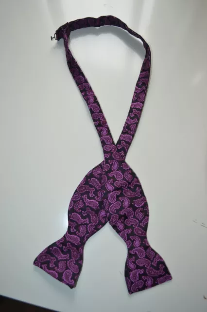Black silk self bow tie with purple paisley print