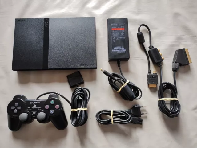 Console PS2 Slim . lecteur top . complète + 1 carte mémoire