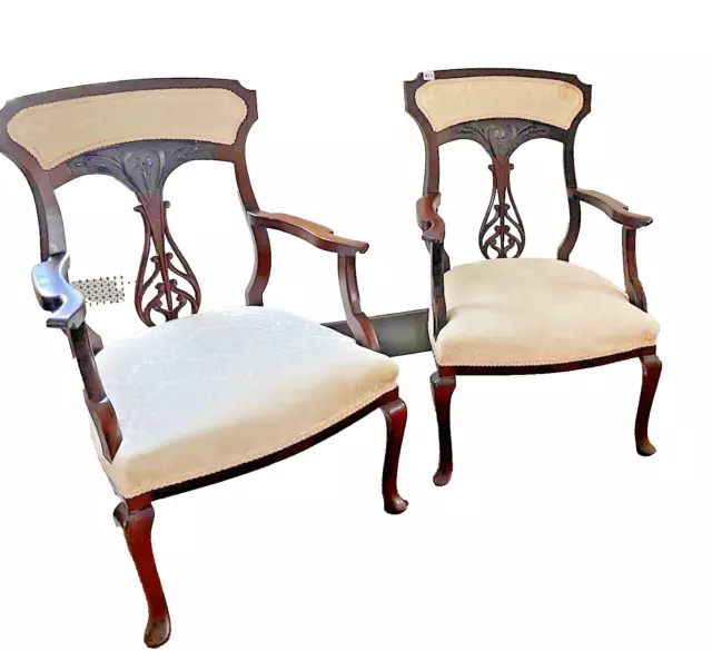 Used Edwardian style set of Two dark mahogany chairs with cream fabric.