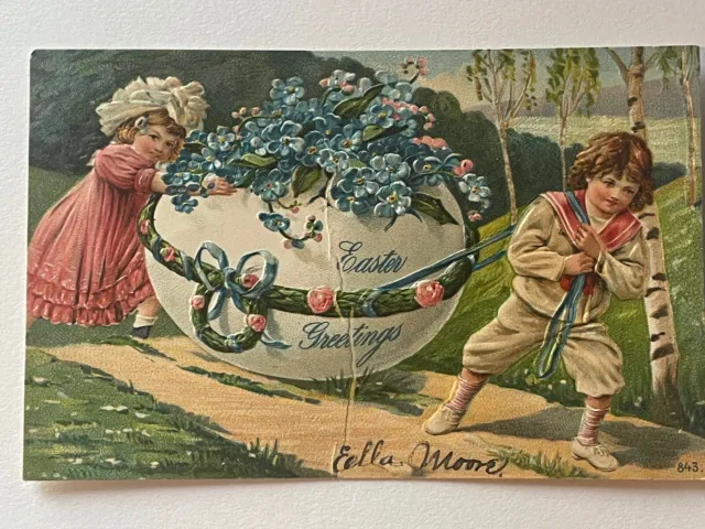 Vintage EASTER GREETINGS Boy & Girl Pulling Egg Flowers Trees 1908 Embossed Nice