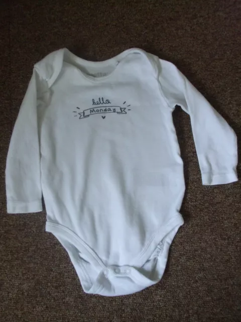 Bundle of baby girl's bodysuits, pants and a babygrow age 6-9 months
