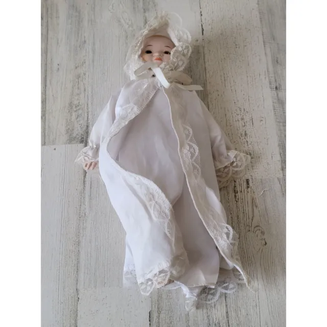 Heritage baby white dress porcelain doll windup music collectible