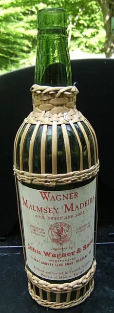 Wagner Malmsey Madeira wine bottle(empty) wicker wrapped. Madeira, Portugal