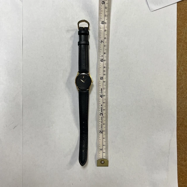 Donna Movado quadrante nero finiture oro 88-66-820N, usata batteria nuova MV66 4