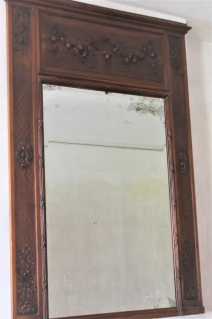 Grand miroir ancien dit trumeau avec cadre en bois sculpté 