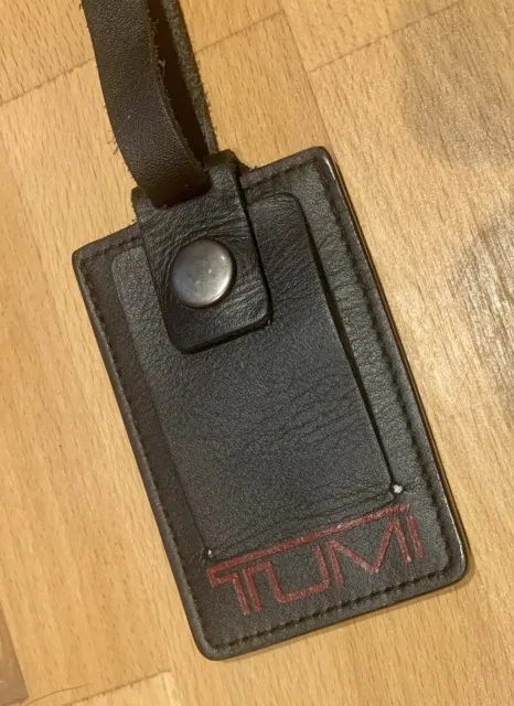 TUMI  Black / Red Leather Luggage Tag