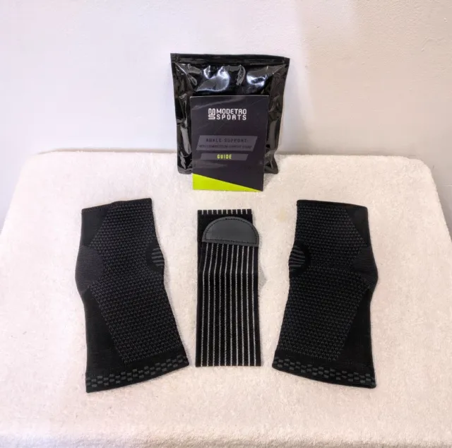 https://www.picclickimg.com/roIAAOSwlfFl160s/Modetro-Sports-Black-Ankle-Supports-With-Compression-Support.webp
