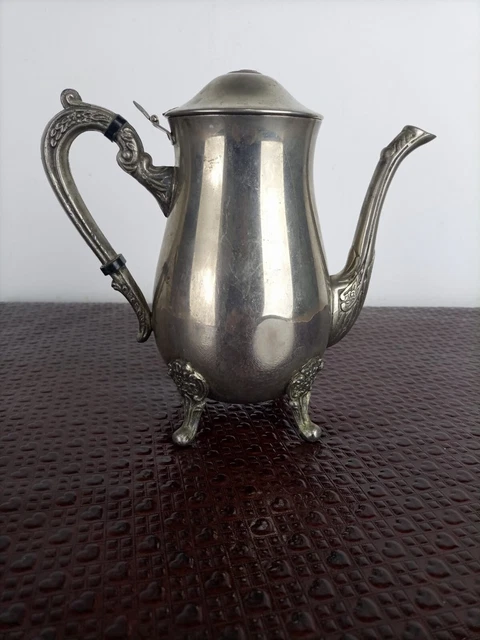 A very old silver plated stainless steel jug, a gift for amateurs of old things