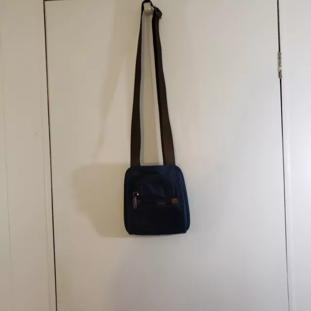 TUMI Small Crossbody Bag Blue Canvas with striped Lining 9"x9" Adjustable strap