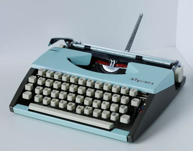 Olympia Deluxe Cursive Portable typewriter