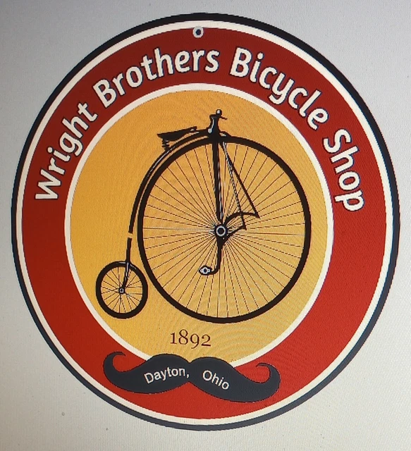 WRIGHT BROTHERS BICYCLE shop round sign Dayton Ohio . Penny Farthing