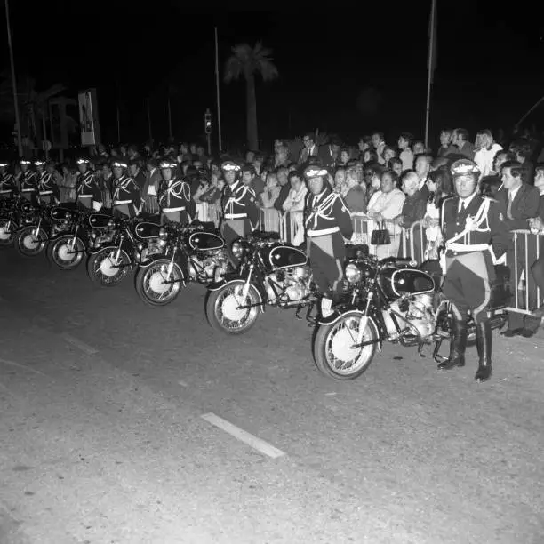 Gendarmerie bikers at attention during the Cannes Film Festival in- Old Photo