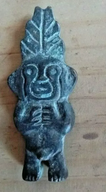 Hybrid idol of Peruvian Inca style made of oxidized copper - symbol of fertility