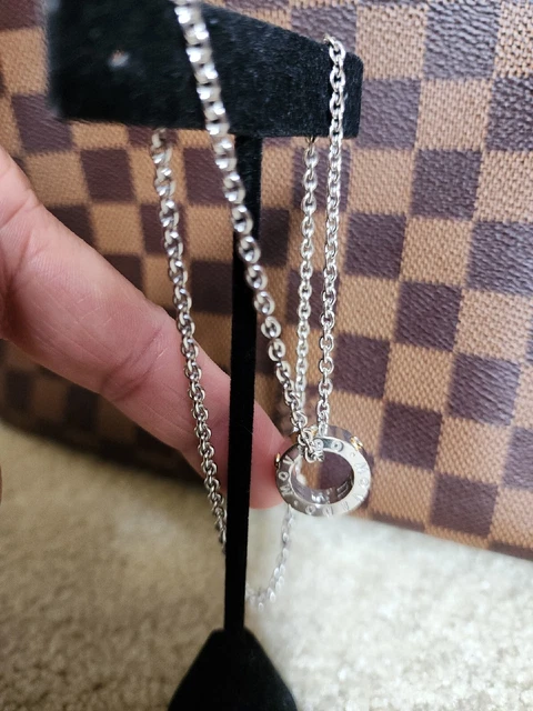 Ladies Movado 18K Gold 0.18ctw Diamond Circle Pendant Two Tone Eternity Necklace Ladies Movado 18K Gold 0.18ctw Diamond Circle Pendant Two Tone Eternity Necklace