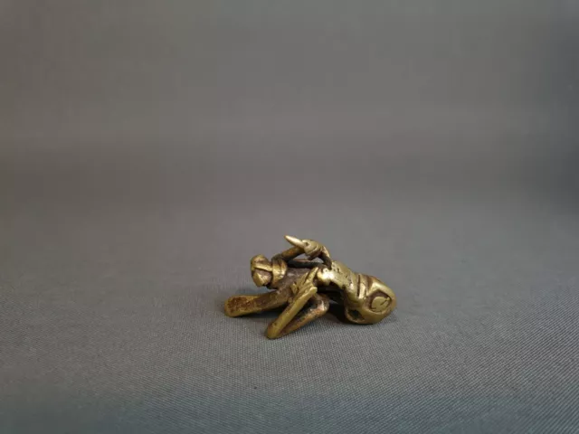 Unusual African Tribal Brass Weight In The Form Of A Man With Prestige Stick And