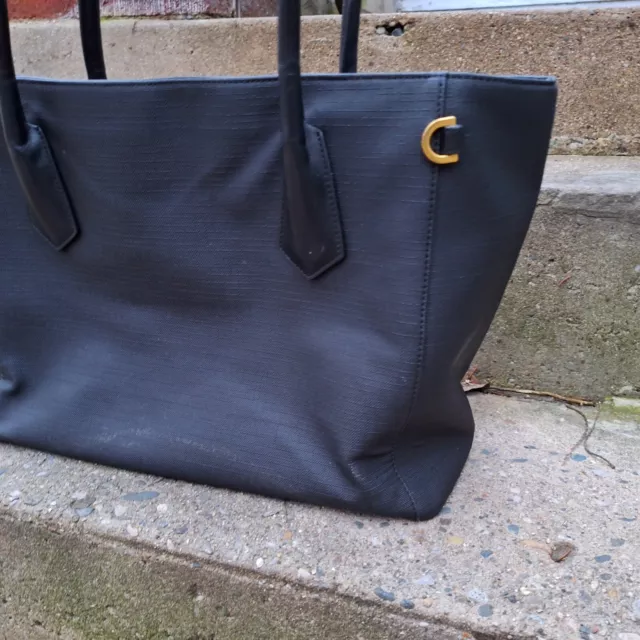 Dagne dover signature 2025 legend coated canvas tote