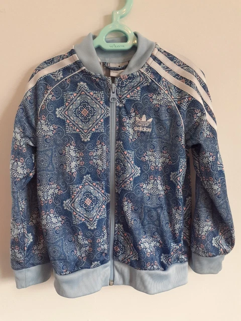 Girls Adidas Jacket Age 4 To 5, patterned blue. Used in good condition.