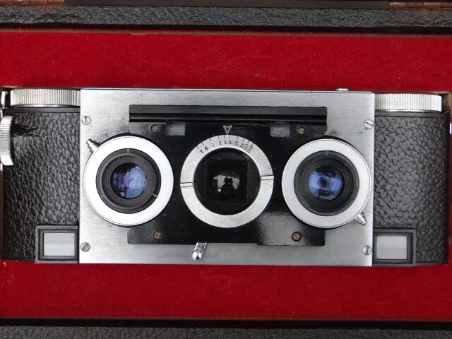 Cámara realista estéreo personalizada vintage, con lentes de tierras raras, en caja.