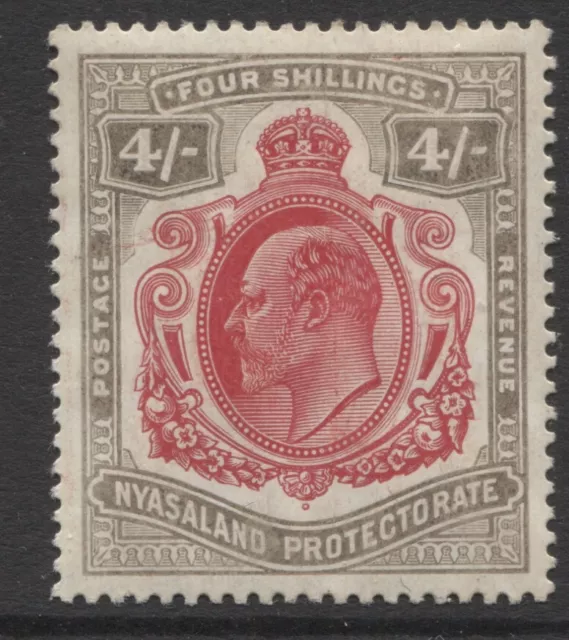 Nyasaland - 1908/11 4/- Carmine & Black Mint (Mlh). Sg.79. (Ref.a6)