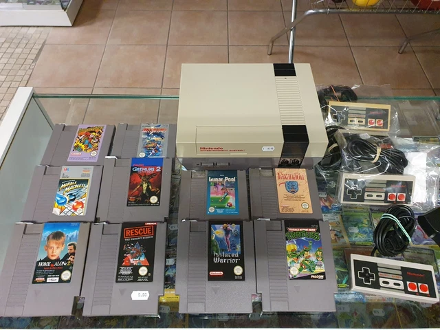 Console Nintendo nes 10 jeux et 4 manettes