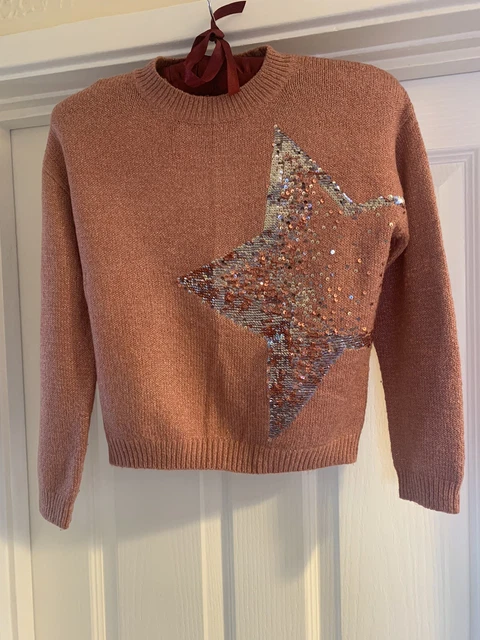 NEXT Maglione rosa scuro per bambina 9 anni con dettaglio paillettes reversibile stella.