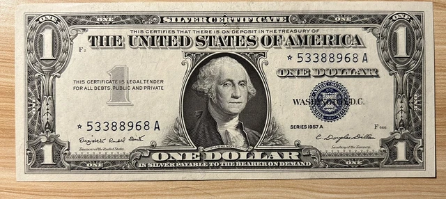 1957- A $1 One Dollar *Star* Note Silver Certificate. Gem Uncirculated.