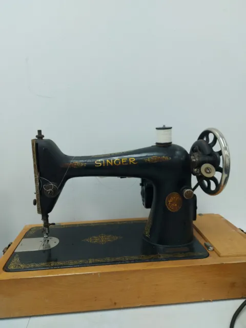 Máquina de coser eléctrica vintage Singer con luz y pedal