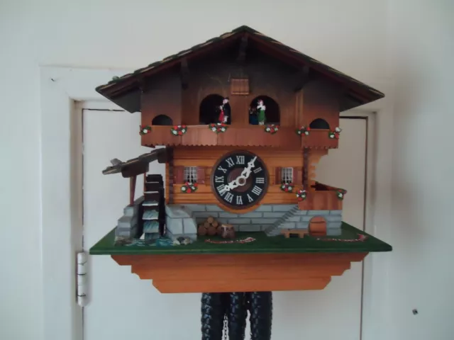 Vintage  Swiss Chalet Musical Cuckoo Clock With Dancers And Water Wheel. 2 Tunes