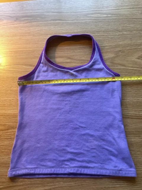 The childrens place girls size 10/12 purple halter top with a butterfly