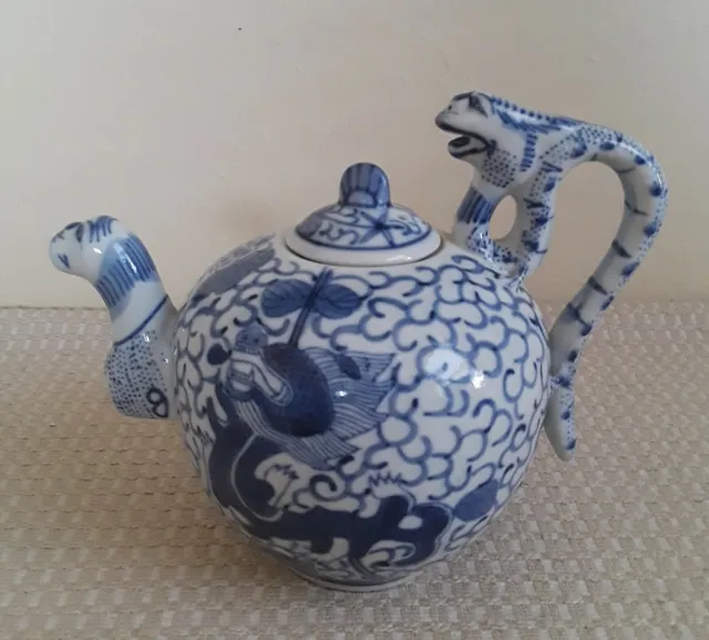 A Antique Chinese Blue & White Porcelain Dragon Teapot. Marked