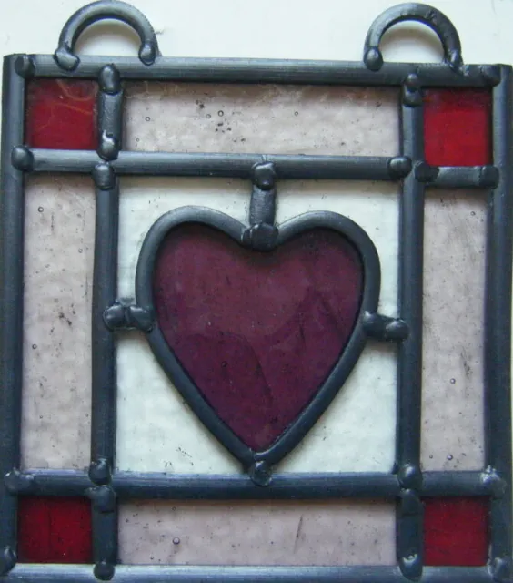 stained glass panel with reclaimed glass .