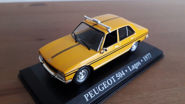 Taxi Peugeot 504 Lagos 1977 1:43 neuf