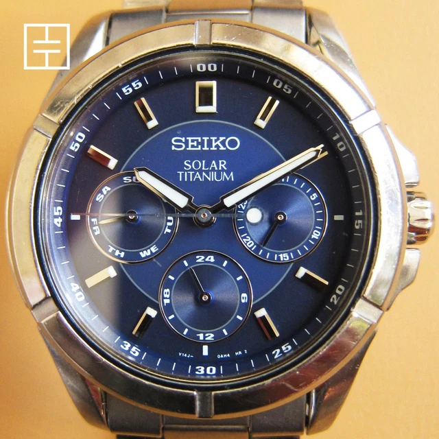 SEIKO V14J-0AE0 SOLAR Titanium Mens Watch with Navy Dial