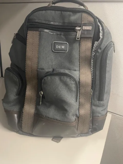 Tumi backpack alpha bravo. Gray and brown. Leather base. 