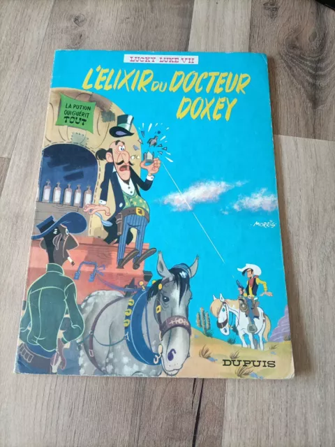 Livre BD Souple  LUCKY LUKE.. L'élixir du Docteur Doxey 1978