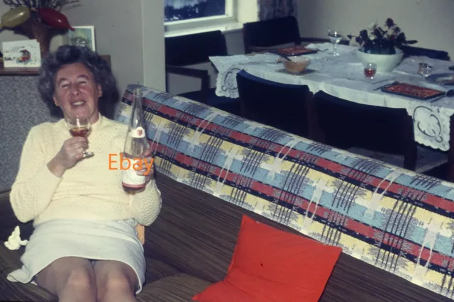 35mm Slide - Woman On Settee Keeping The Wine To Herself, 1970s