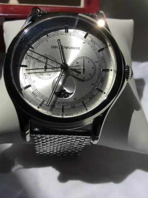 MONTRE CHRONOGRAPHE EMPORIO Armani de fabrication suisse mouvement quartz cadran argent EUR 1.006 54 PicClick FR
